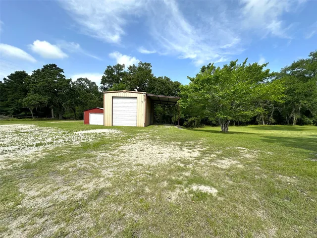 a house view with a garden space