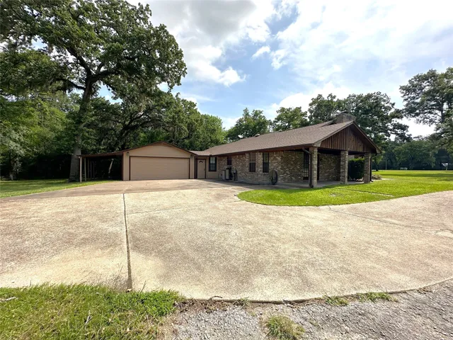 a house with trees in the background