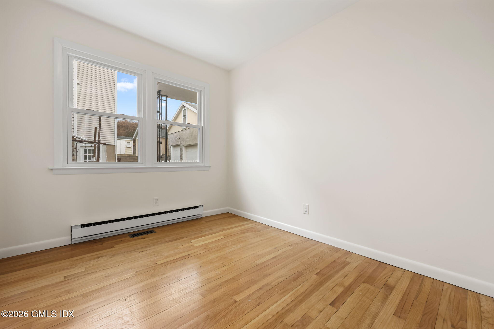 2 Grange Street Greenwich, CT 06830 - Photo 21 of 31 an empty room with windows