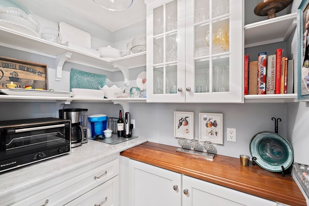 273 Wareham Street Middleboro, MA 02346 - Photo 11 of 42 a kitchen with stainless steel appliances granite countertop a sink and cabinets