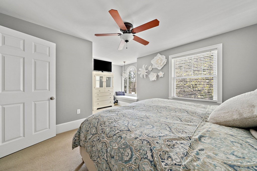 273 Wareham Street Middleboro, MA 02346 - Photo 21 of 42 a bedroom with a large bed and a window