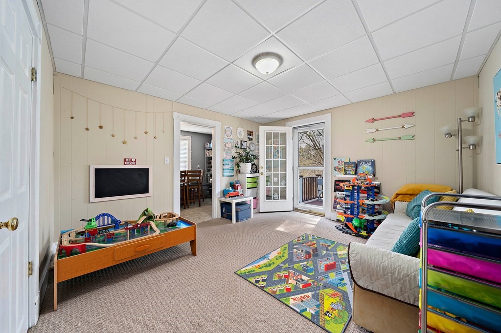 273 Wareham Street Middleboro, MA 02346 - Photo 30 of 42 a bedroom with furniture and a flat screen tv