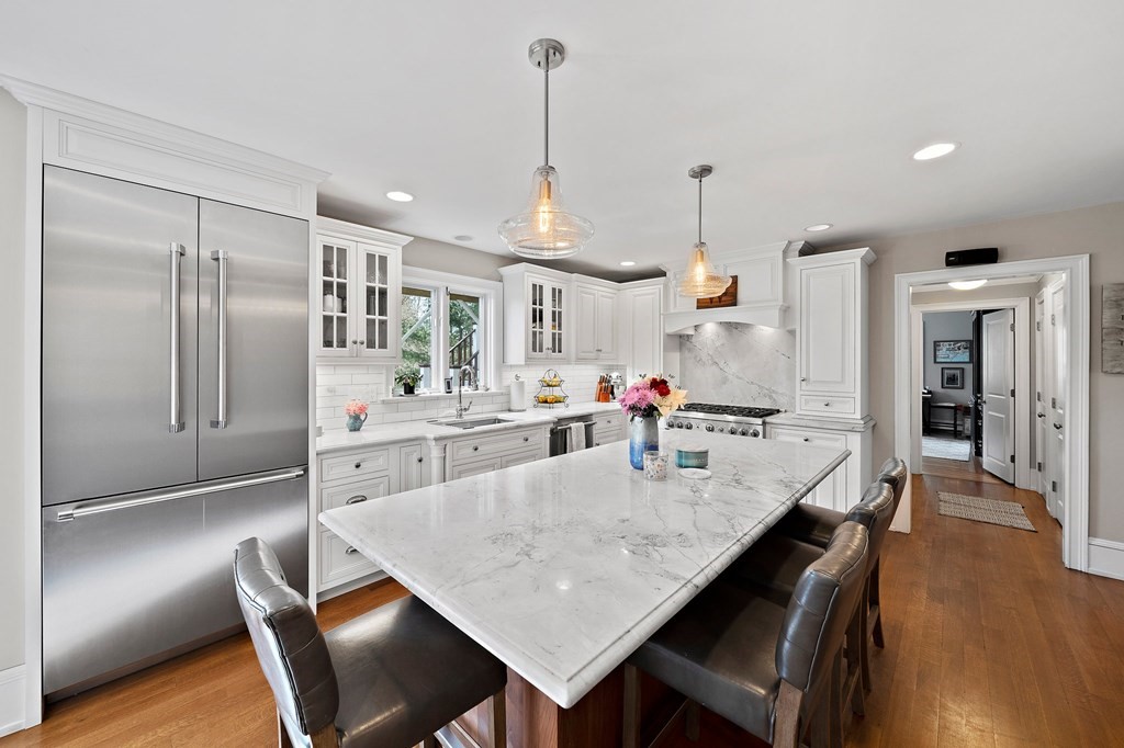 273 Wareham Street Middleboro, MA 02346 - Photo 4 of 42 a dining area with furniture a chandelier and wooden floor