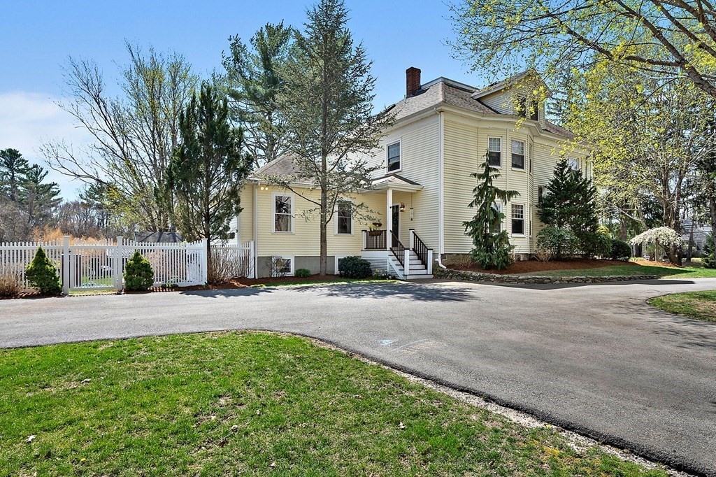 273 Wareham Street Middleboro, MA 02346 - Photo 41 of 42 a front view of a house with a yard and garage