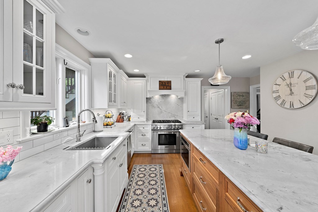 273 Wareham Street Middleboro, MA 02346 - Photo 6 of 42 a kitchen with a sink cabinets and stainless steel appliances