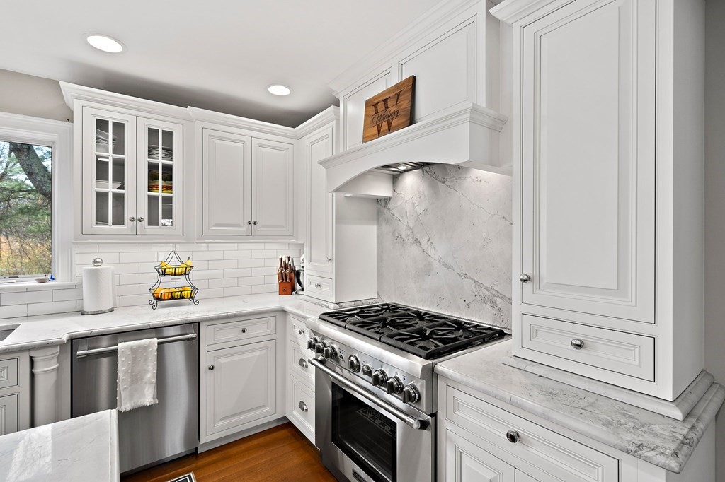 273 Wareham Street Middleboro, MA 02346 - Photo 9 of 42 a kitchen with stainless steel appliances granite countertop a stove and a sink