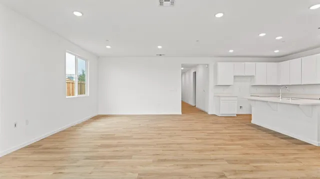 a view of kitchen with wooden floor