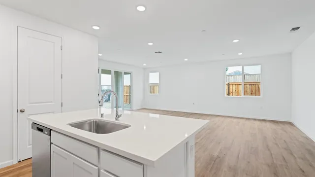 a view of kitchen and sink