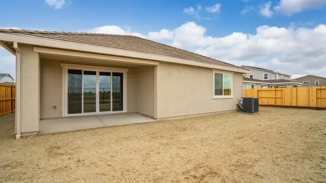 a view of an house with backyard space