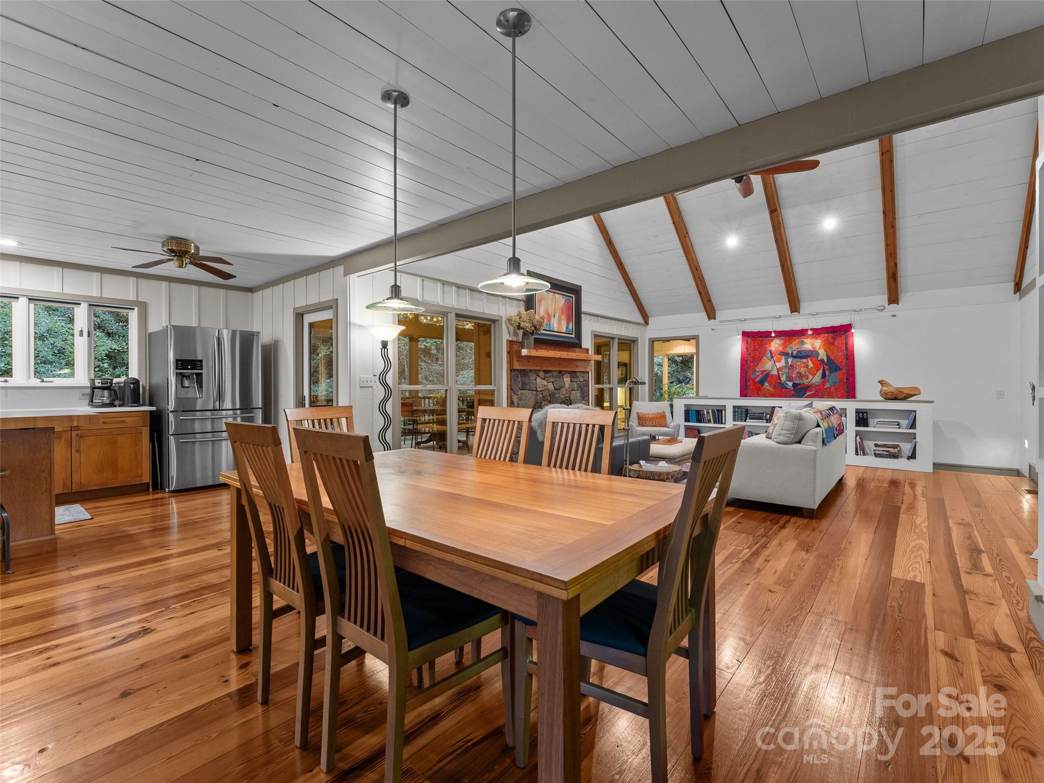 273 David's Trace Pisgah Forest, NC 28768 - Photo 15 of 48 a view of a dining area with furniture and wooden floor