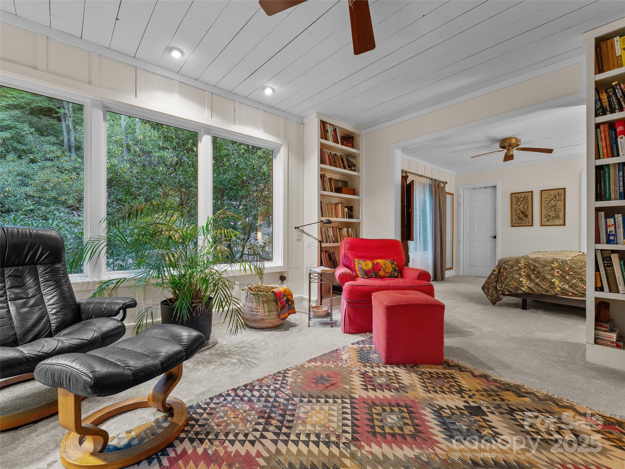 273 David's Trace Pisgah Forest, NC 28768 - Photo 23 of 48 a living room with furniture and a large window