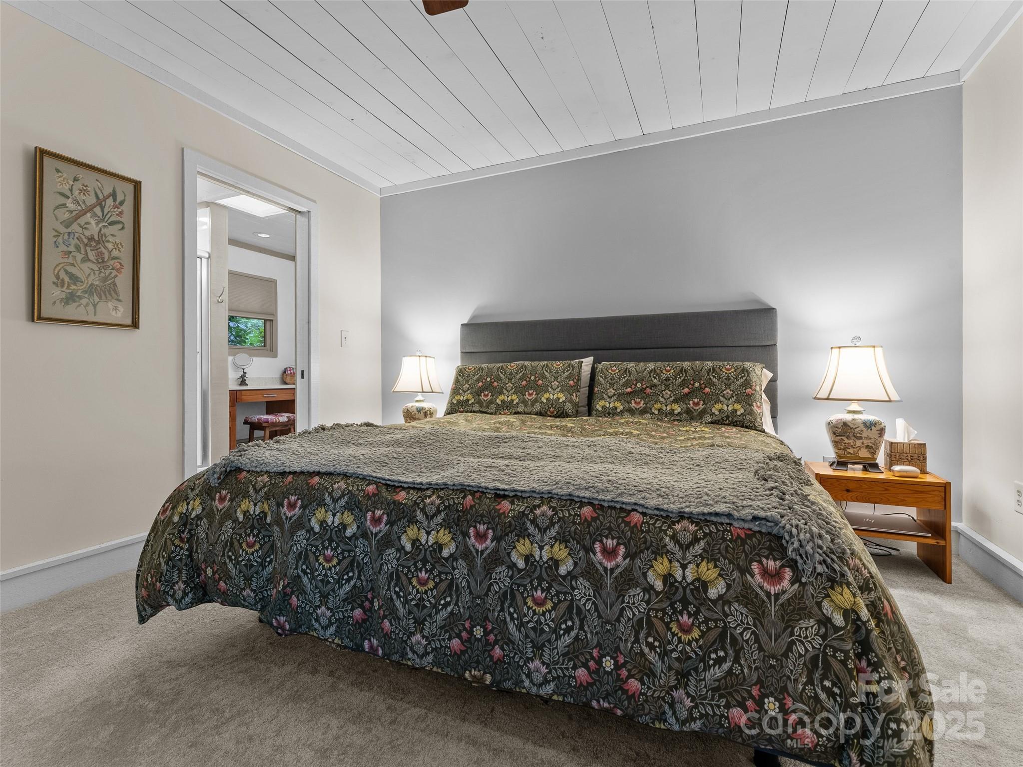 273 David's Trace Pisgah Forest, NC 28768 - Photo 25 of 48 a bedroom with a bed and window