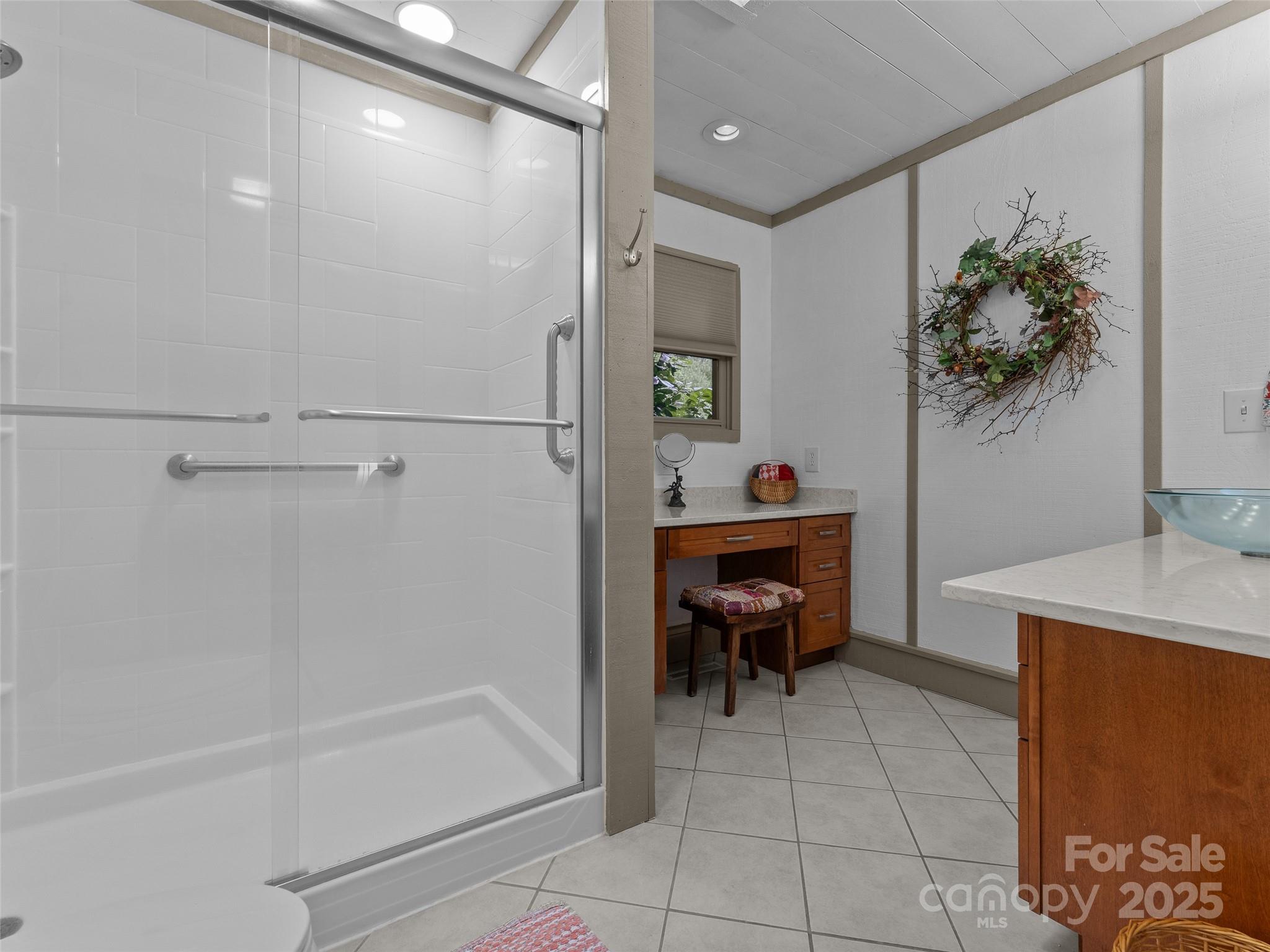 273 David's Trace Pisgah Forest, NC 28768 - Photo 26 of 48 a bathroom with a sink and a bath tub