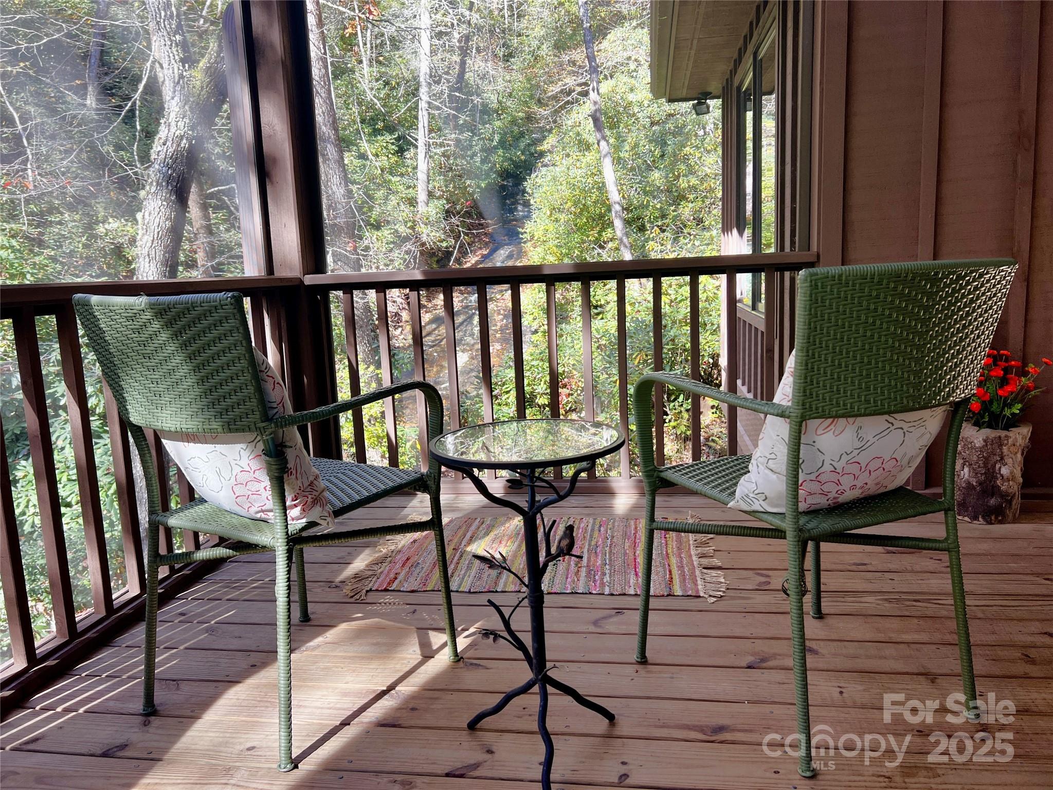 273 David's Trace Pisgah Forest, NC 28768 - Photo 30 of 48 a view of a chairs and table in the balcony
