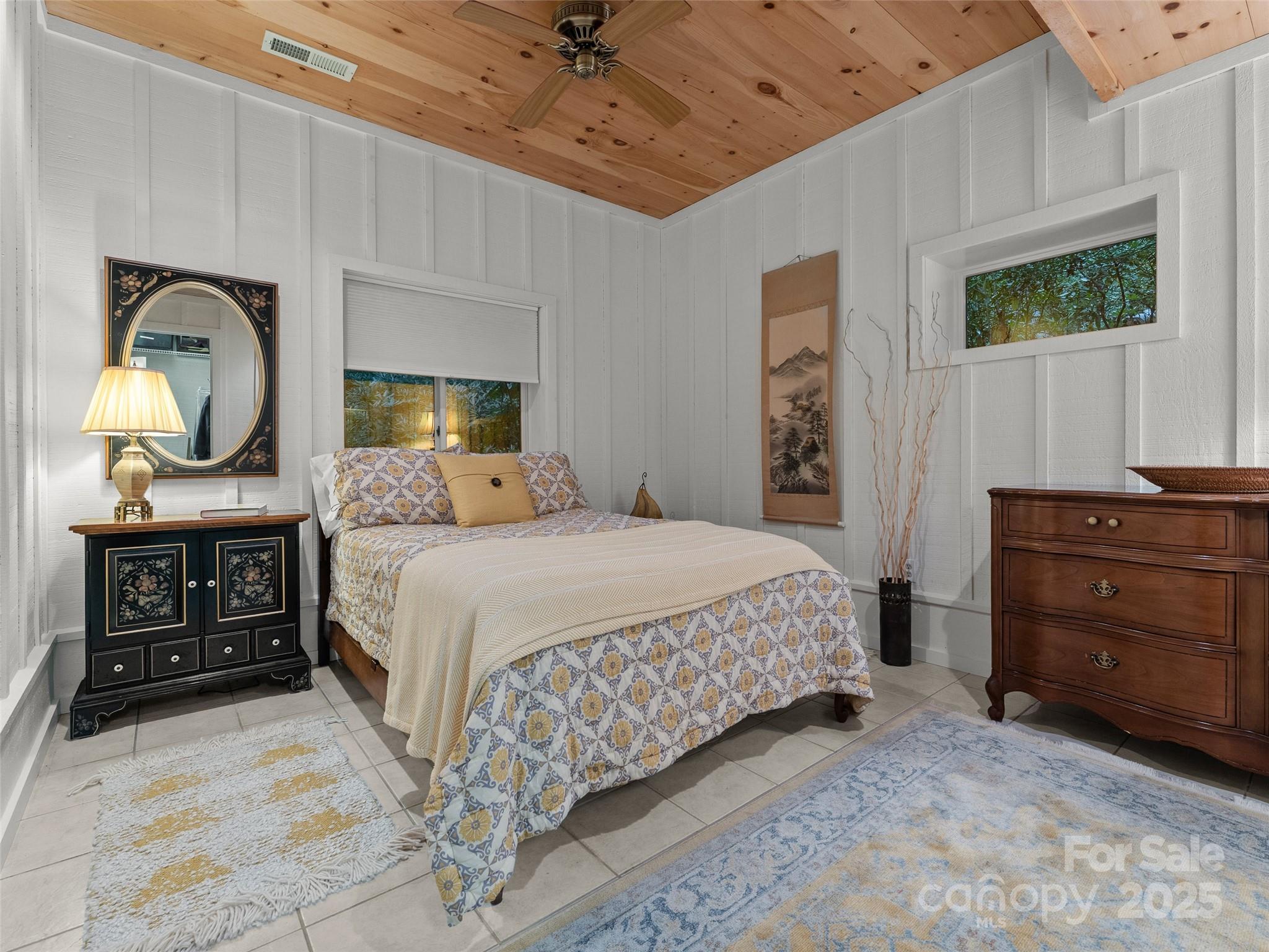 273 David's Trace Pisgah Forest, NC 28768 - Photo 38 of 48 a bedroom with a bed and a dresser