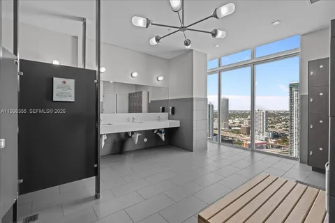a large en suite bathroom with a large tub and shower