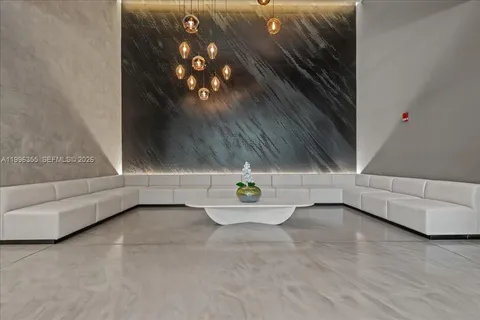 a view of an empty room with stairs