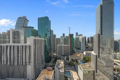 a view of city with tall buildings