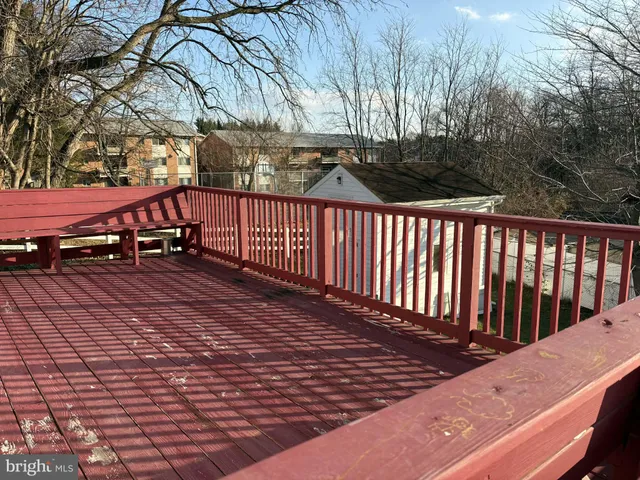 a view of street with wooden deck