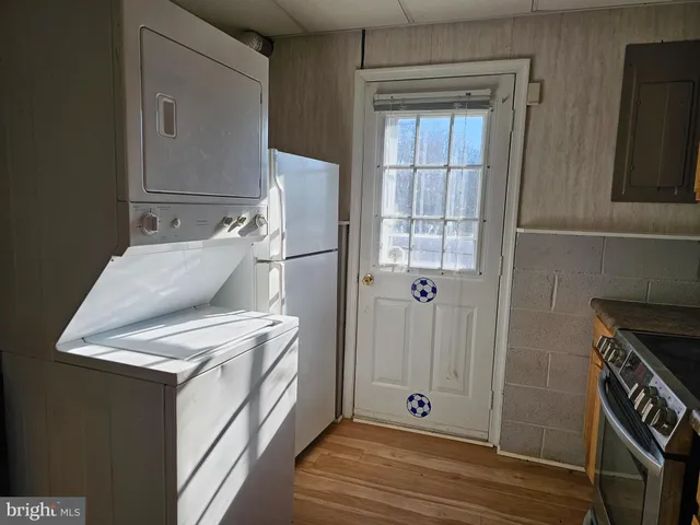 a view of kitchen and utility room