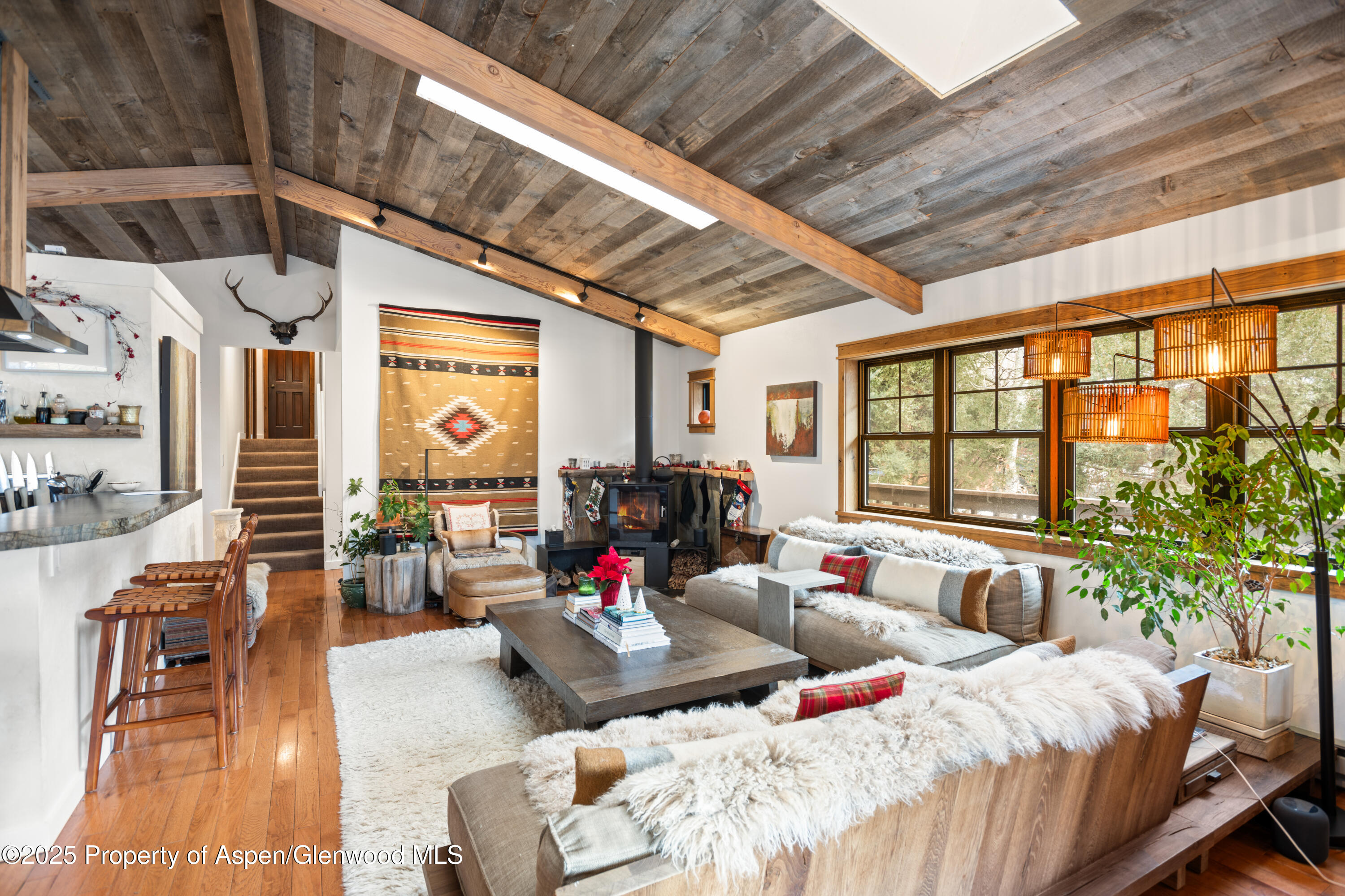 113 Crossland Drive Basalt, CO 81621 - Photo 5 of 28 a living room with furniture and a large window