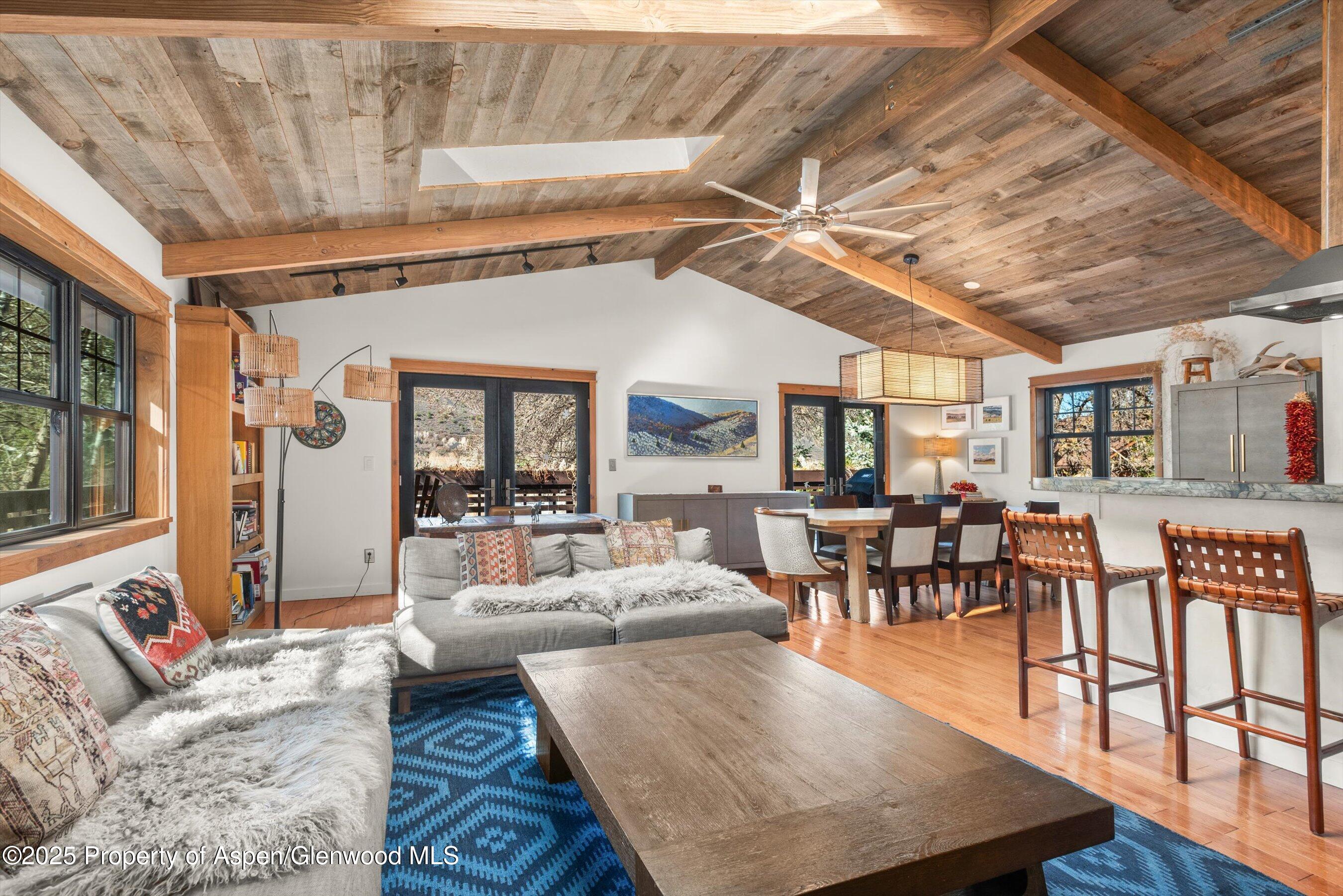 113 Crossland Drive Basalt, CO 81621 - Photo 6 of 28 a living room with furniture and a wooden floor