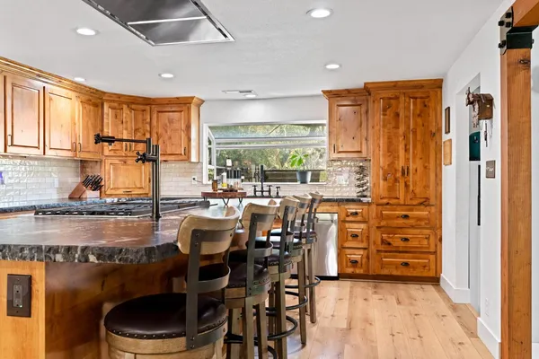a bed room with furniture and a fireplace