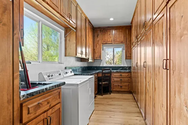 a bedroom with a bed and a couch