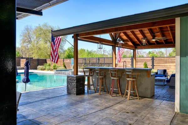 a view of a yard with an outdoor space