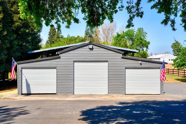 a view of outdoor space with deck and a garden