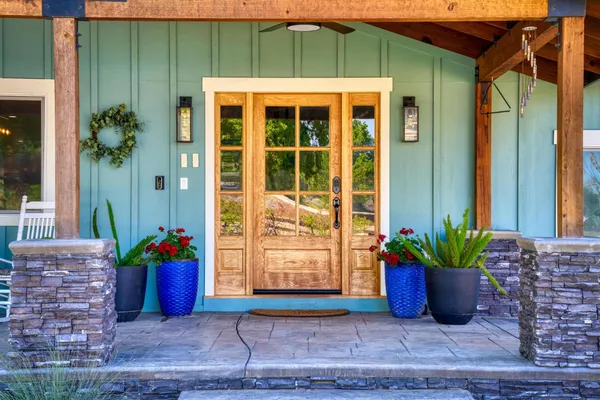 a kitchen with stainless steel appliances granite countertop a stove and a sink