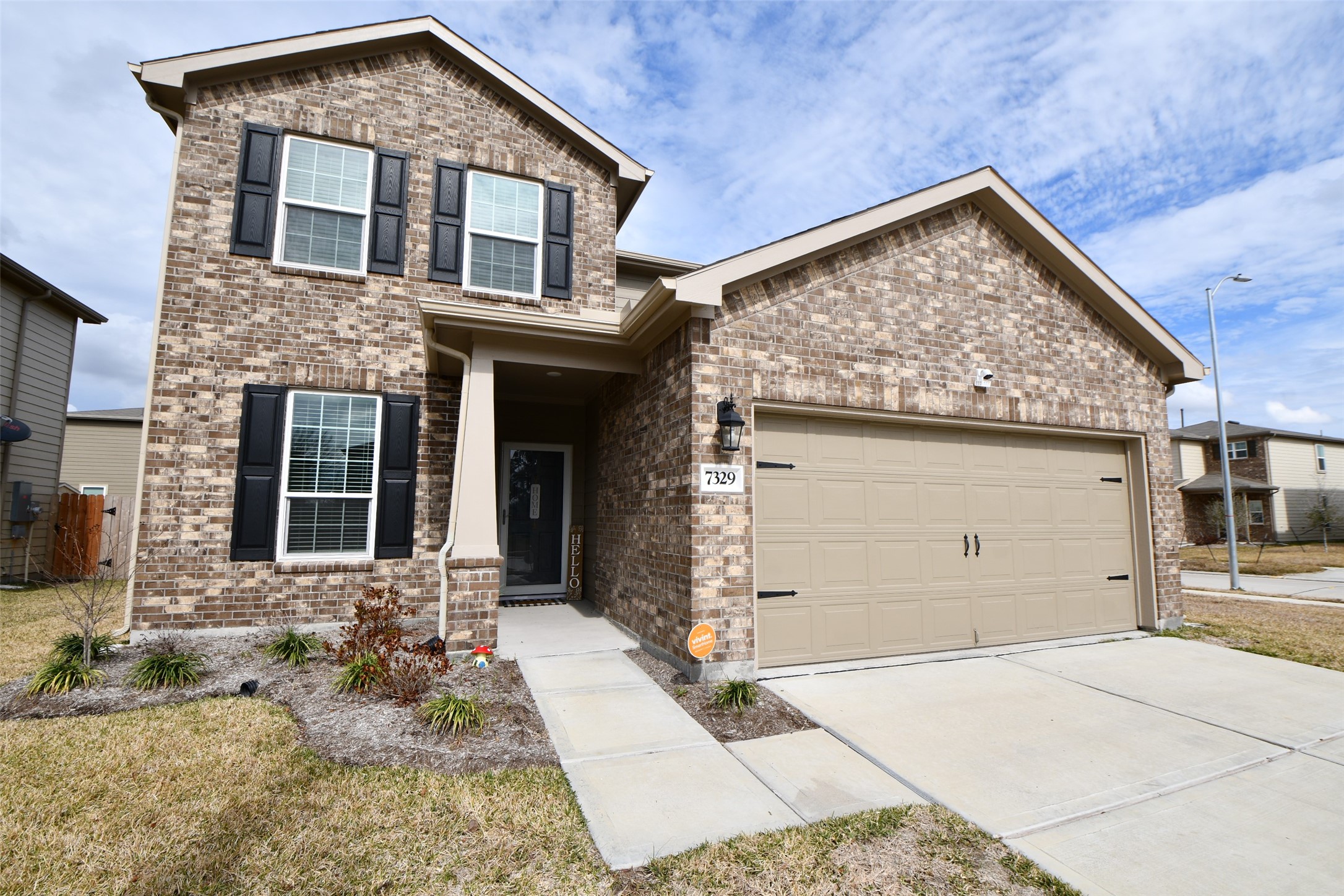 7329 Madison Commons Lane Houston, TX 77075 - Photo 22 of 22 a view of a house with a yard and sitting area
