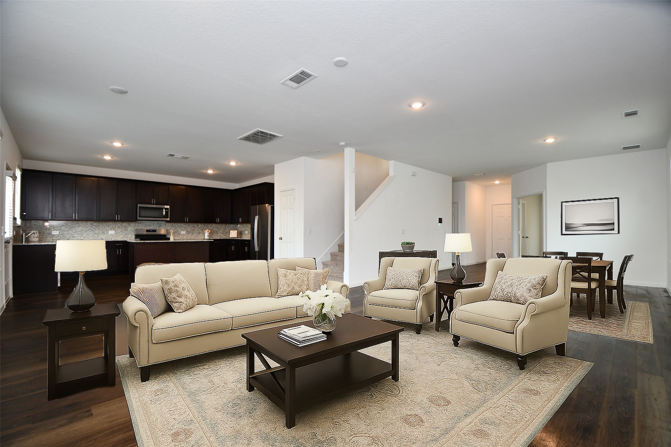 7329 Madison Commons Lane Houston, TX 77075 - Photo 7 of 22 a living room with furniture and view of kitchen