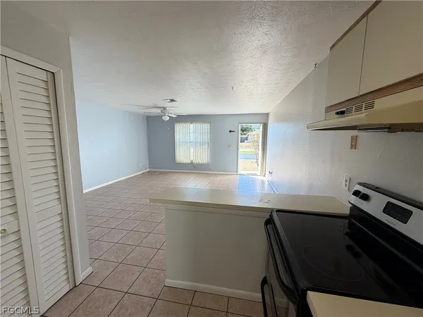 a room with a table and chairs