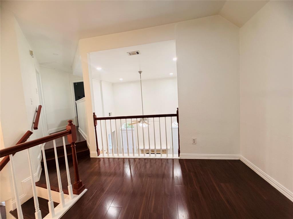 434 Moonlight Way Irving, TX 75063 - Photo 16 of 29 a view of entryway with wooden floor