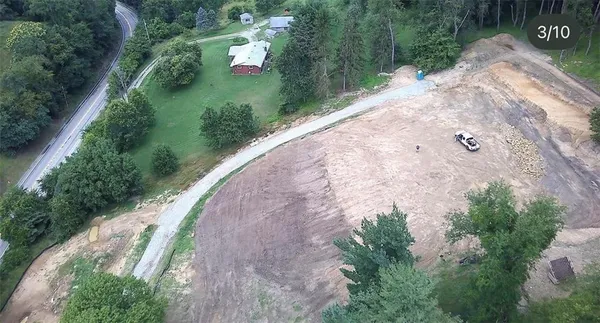 a view of a backyard of the house