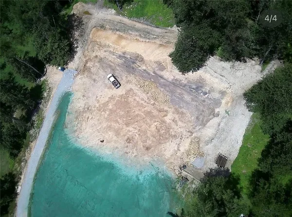 a view of a backyard of the house