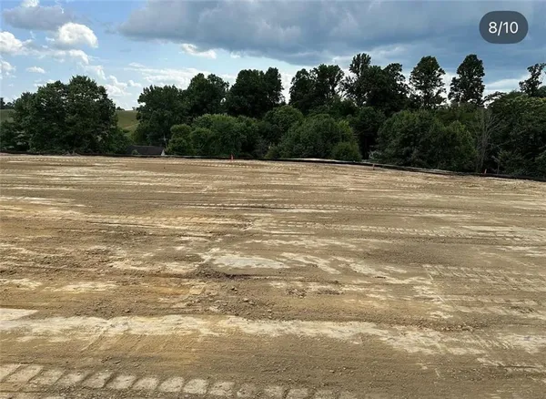 a view of backyard with green space