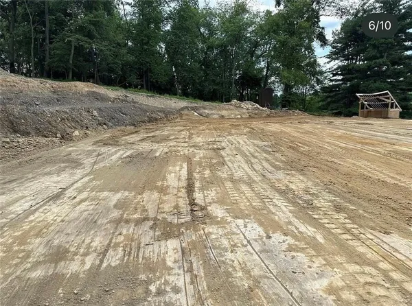 a view of swimming pool with an outdoor space and seating area