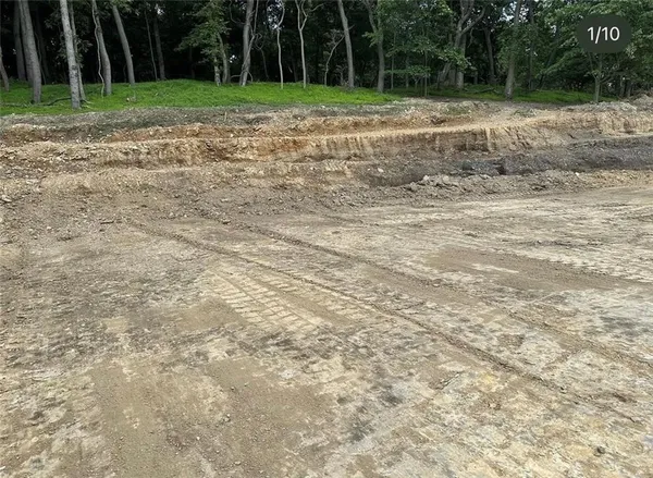 a view of a backyard of a house