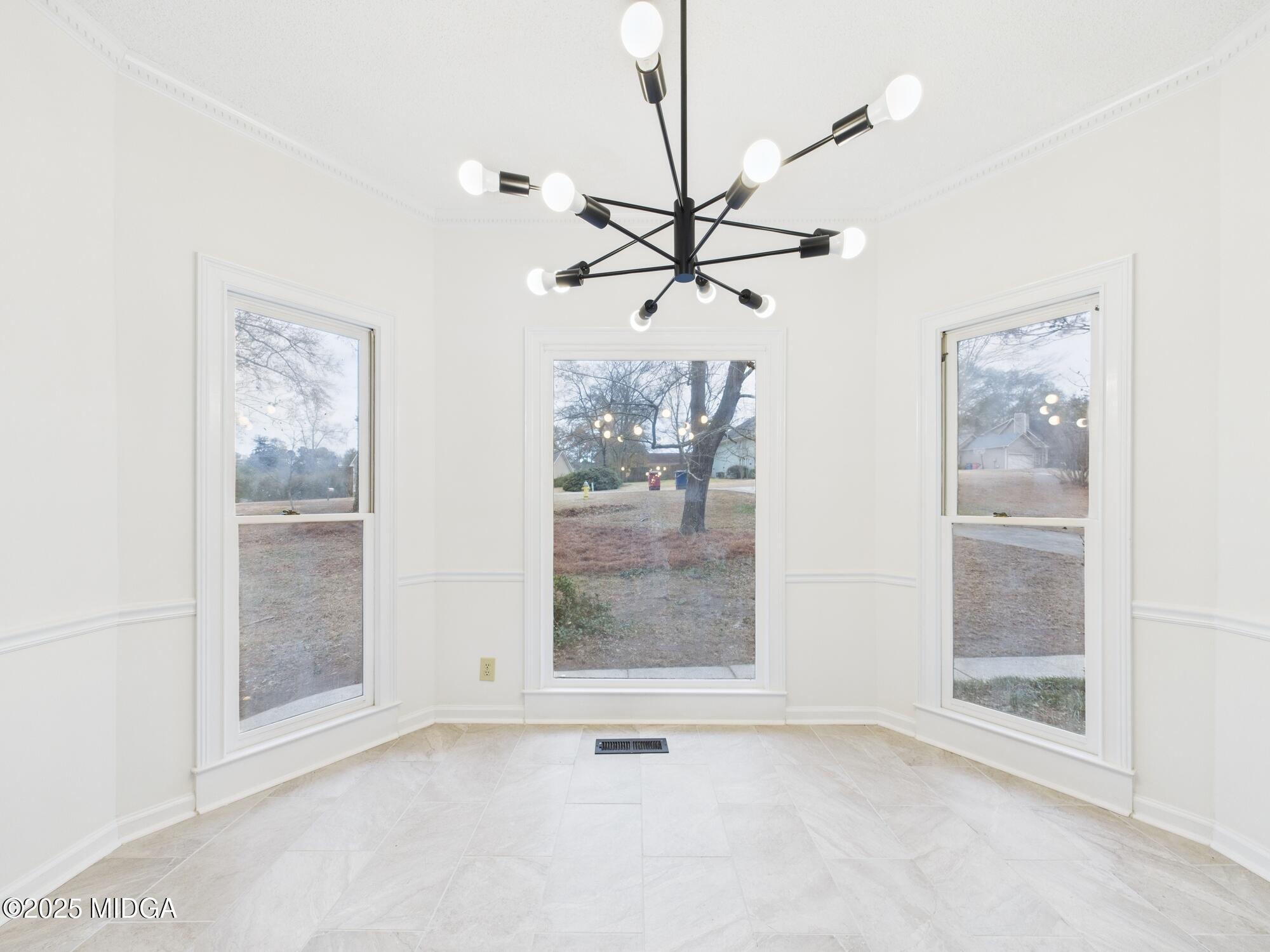 607 Chastain Place Macon, GA 31210 - Photo 20 of 63 a view of an empty room with a fan