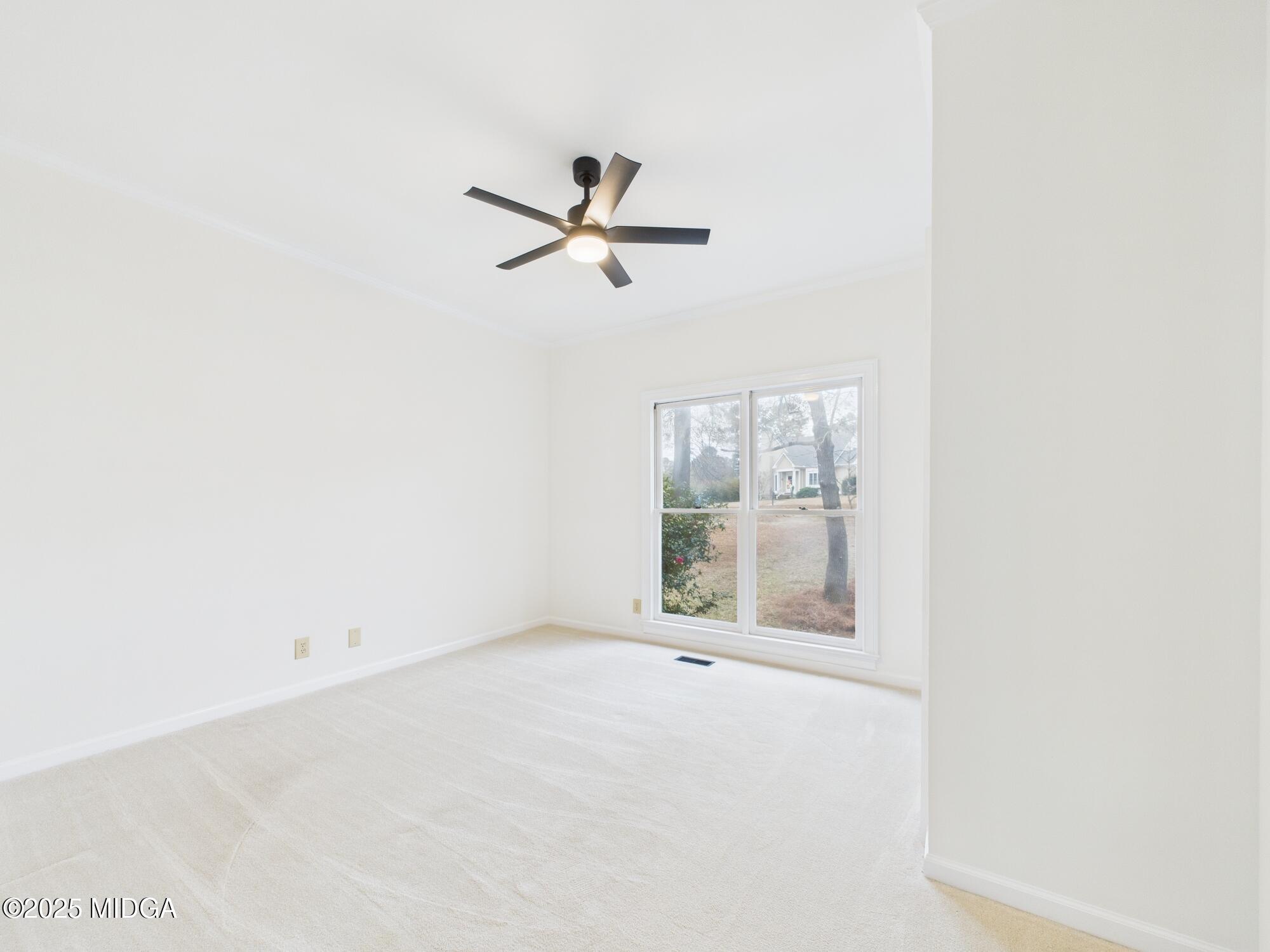 607 Chastain Place Macon, GA 31210 - Photo 25 of 63 an empty room with a window
