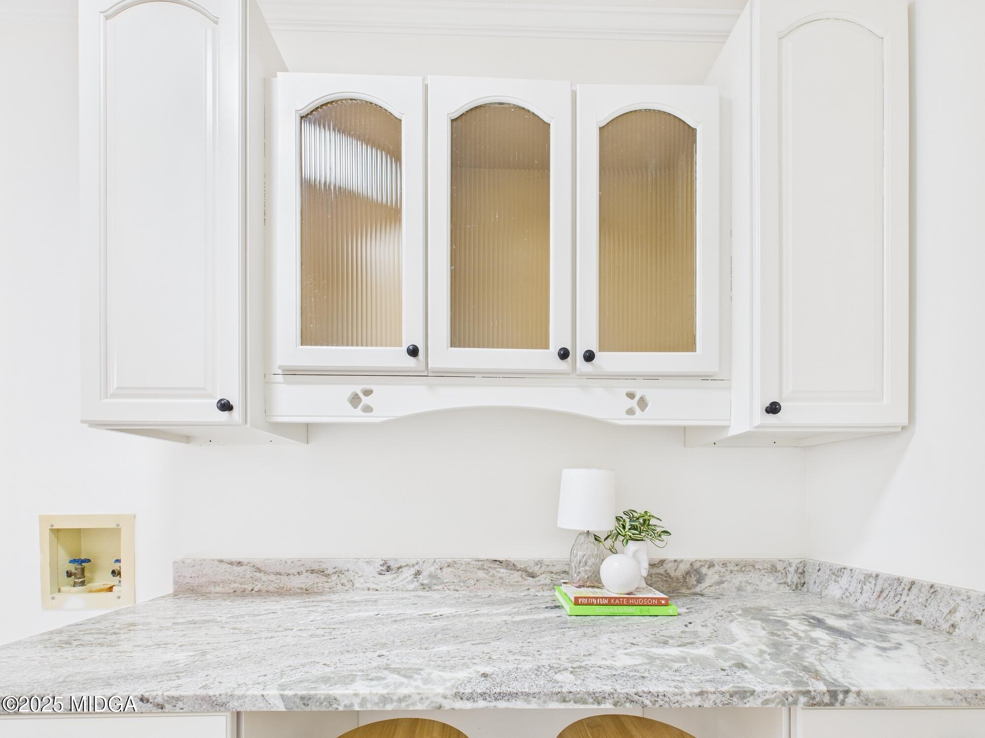 607 Chastain Place Macon, GA 31210 - Photo 37 of 63 a bathroom with a granite countertop sink and a window