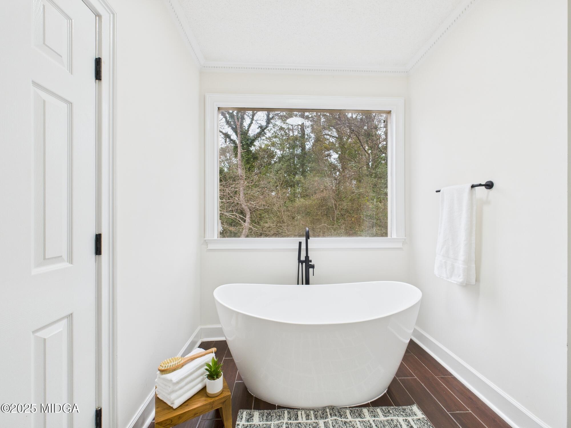 607 Chastain Place Macon, GA 31210 - Photo 43 of 63 a white bath tub sitting next to a window