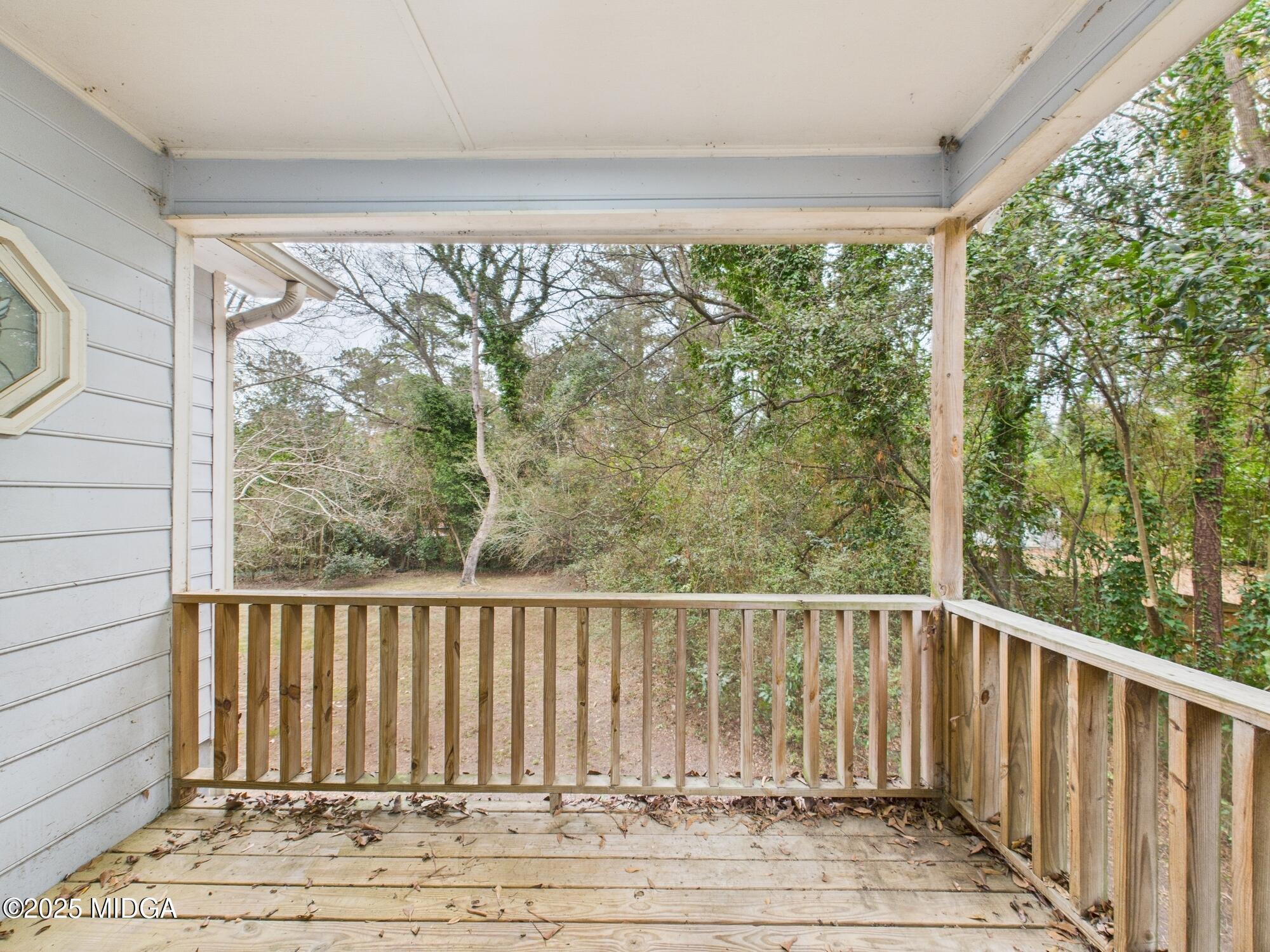 607 Chastain Place Macon, GA 31210 - Photo 50 of 63 a view of a wooden balcony