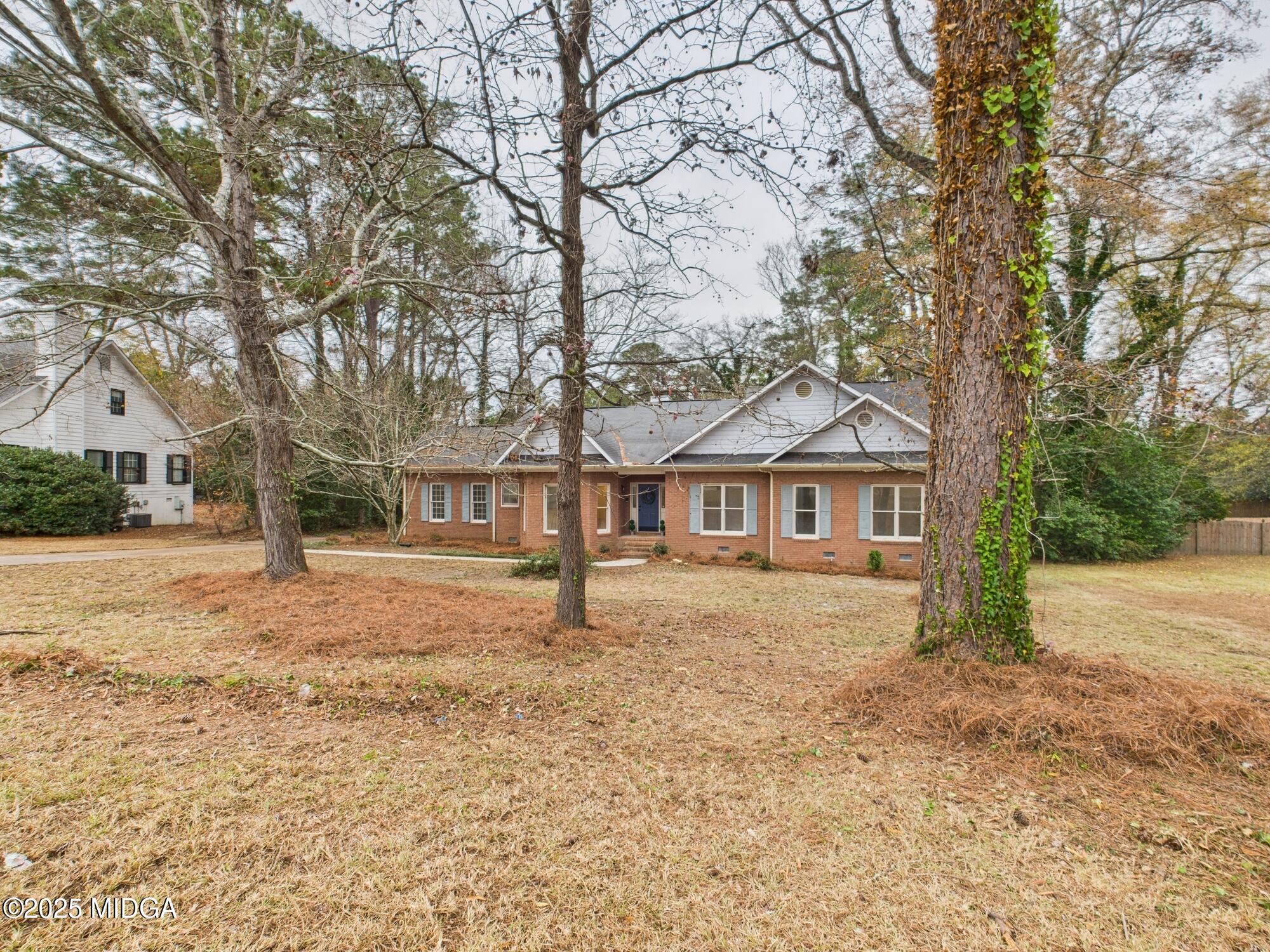 607 Chastain Place Macon, GA 31210 - Photo 62 of 63 a view of a house with a yard