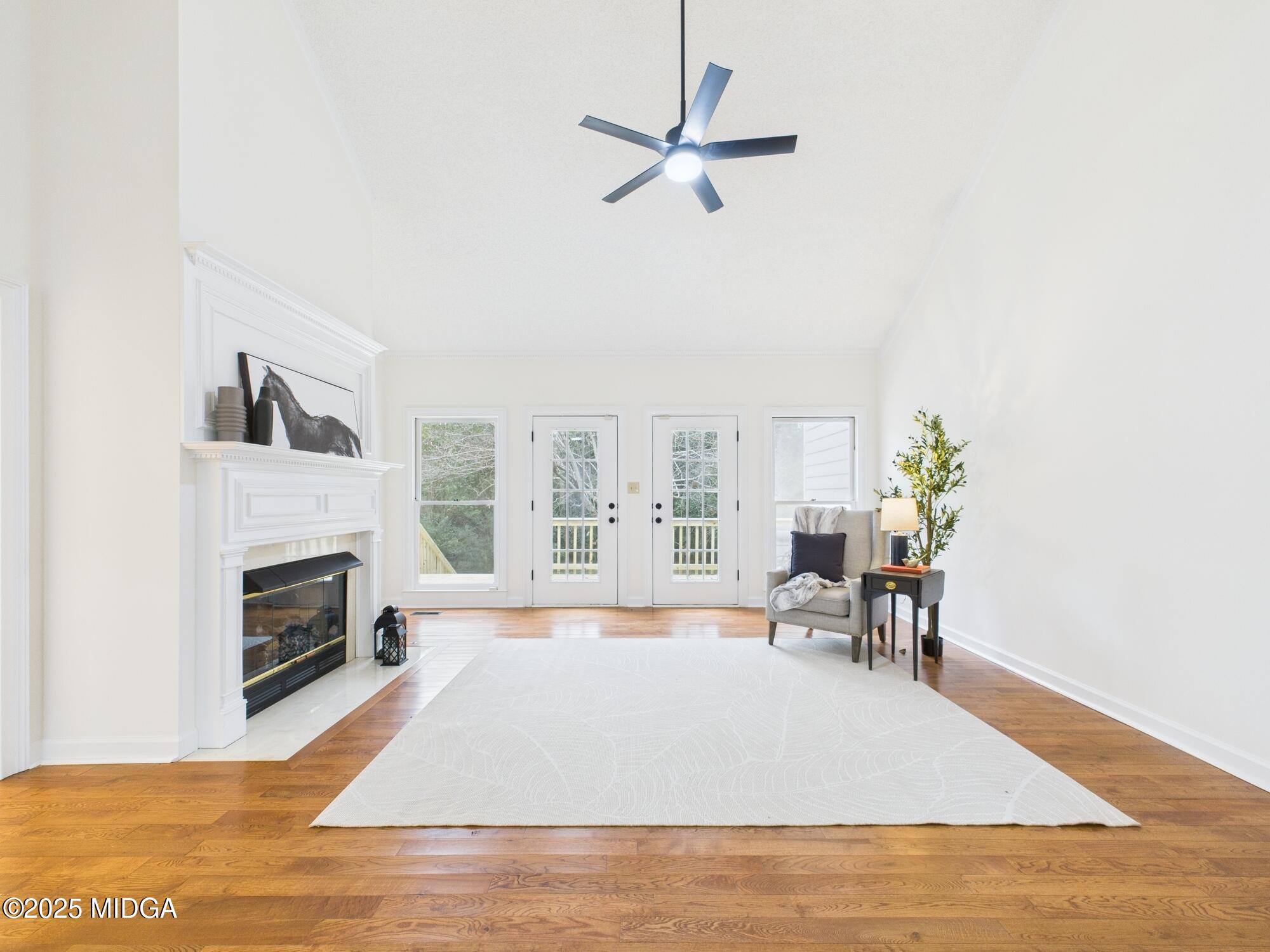 607 Chastain Place Macon, GA 31210 - Photo 7 of 63 a living room with furniture fireplace and a table