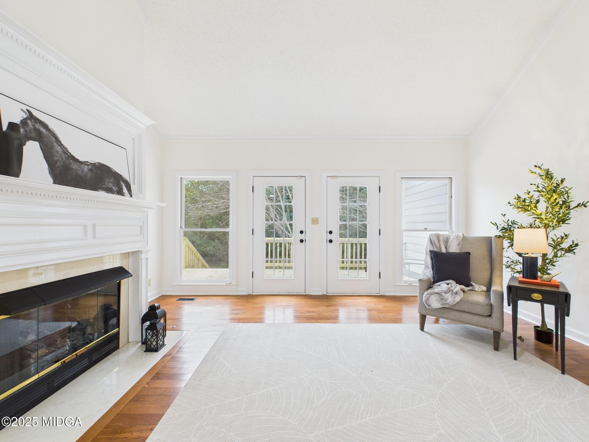 607 Chastain Place Macon, GA 31210 - Photo 10 of 63 a living room with furniture and a fireplace