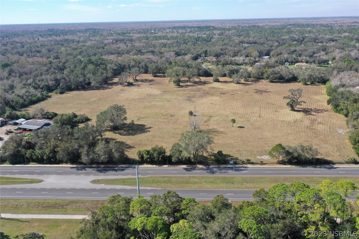 4558 South Ridgewood Avenue Edgewater, FL 32141 - Photo 9 of 9 a view of a lake with beach and ocean view