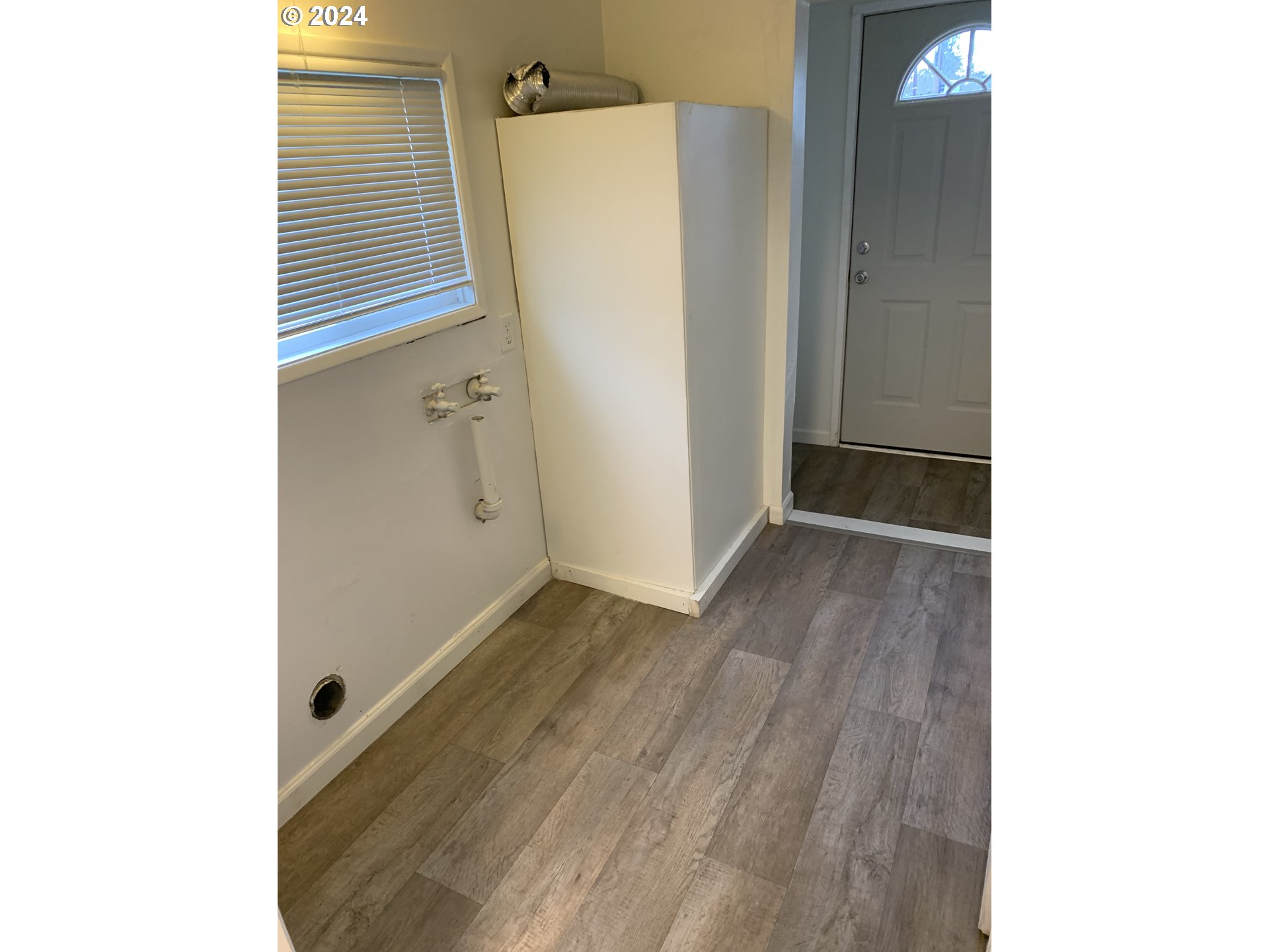 630 1st Street Springfield, OR 97477 - Photo 18 of 18 a view of a hallway with wooden floor